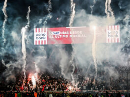 Paraguay players and fans celebrate their World Cup qualification...