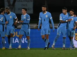 Uruguay players celebrate against Peru...